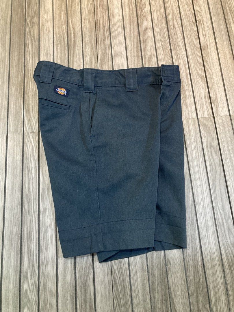 Dickies Navy Blue Work Shorts (Category: Shorts) located in Trece Martires City. Submitted by thriftkoto.91 (Listing ID 1466257297, Image 1). Description: - Authentic Dickies navy blue work shorts - Classic style made with heavy-duty twill fabric - Features sturdy belt loops and a zip fly with hook and bar closure - Includes two front pockets and two back welt pockets (one with Dickies logo patch, one with button closure) - Stylish printed inner 