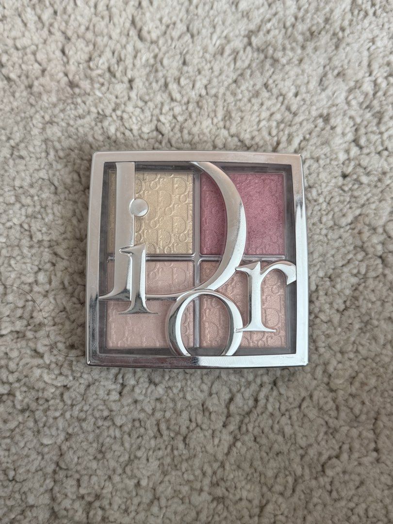 Dior Backstage Glow Maximizer Palette (Category: Makeup) located in Pasig City. Submitted by zenowl.61105a (Listing ID 1466190181, Image 1). Description: -Multi-use highlighter and blush palette from Dior. -Four shades total including gold, pink, and neutral shimmer tones. -Stamped monogram pattern across all pans. -Transparent compact with silver branding on lid. -Back label shows shade details and 10g weight. -Authentic packaging with batch cod
