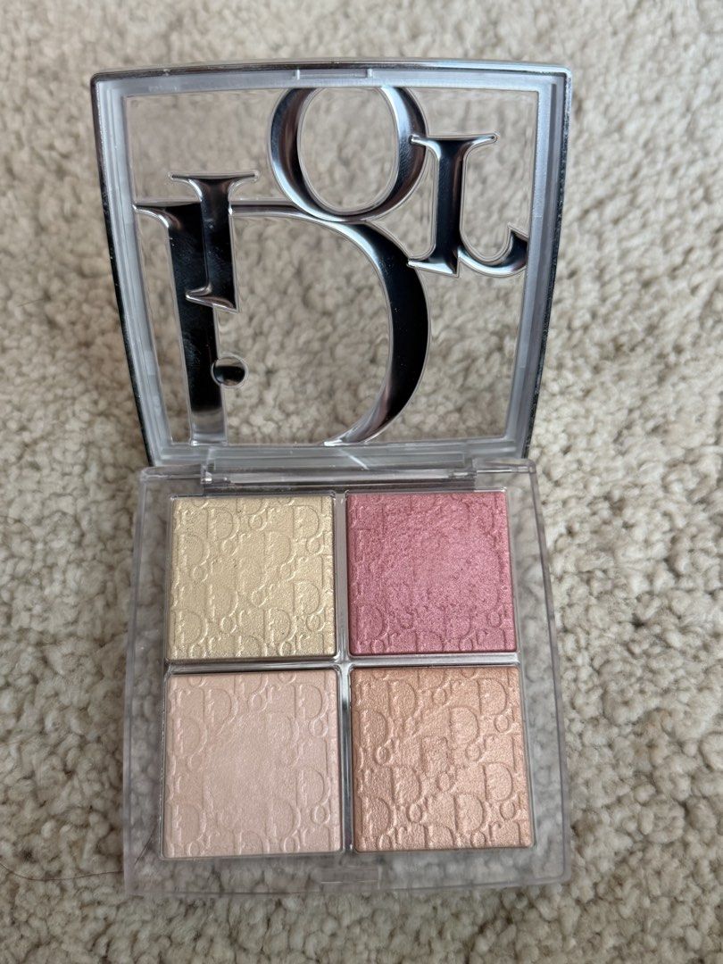 Dior Backstage Glow Maximizer Palette (Category: Makeup) located in Pasig City. Submitted by zenowl.61105a (Listing ID 1466190181, Image 2). Description: -Multi-use highlighter and blush palette from Dior. -Four shades total including gold, pink, and neutral shimmer tones. -Stamped monogram pattern across all pans. -Transparent compact with silver branding on lid. -Back label shows shade details and 10g weight. -Authentic packaging with batch cod
