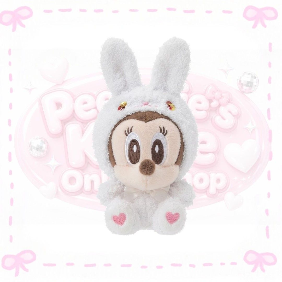 Disney Minnie Mouse Bunny Plush Toy (Category: Plushies & Soft Toys) located in Sorsogon. Submitted by mitchelle0425 (Listing ID 1466211764, Image 1). Description: - Authentic Disney Parks merchandise - Fluffy Minnie Mouse plush in a cute white bunny costume - Features floppy bunny ears, small gold bells, and a white neck ribbon - Sweet pink embroidered hearts detail on the feet - Made with ultra-soft textured fabric - Perfect for collectors and 