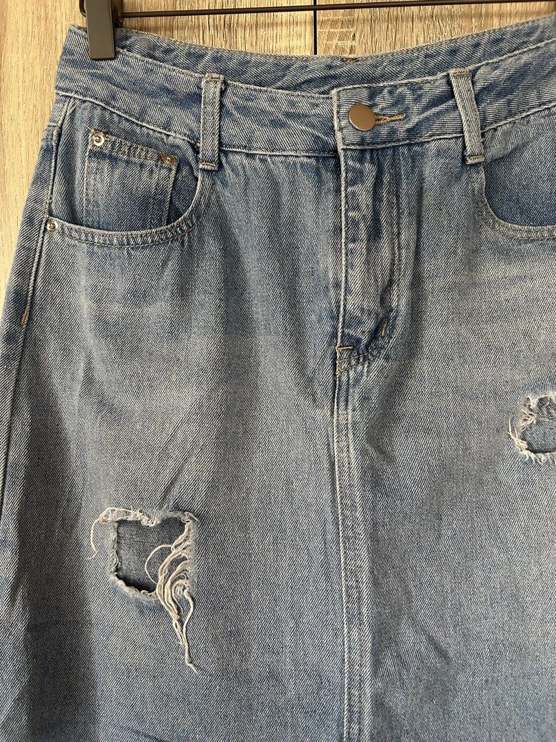 Distressed denim long skirt (Category: Skirts) located in Bulacan. Submitted by relove.re (Listing ID 1466233846, Image 3). Description: Size XS to S ✨ Light-wash denim skirt ✨ High-waisted / relaxed fit ✨ Distressed ripped details ✨ Classic 5-pocket style ✨ Casual & easy to style ✨ Perfect for everyday OOTD 👖.