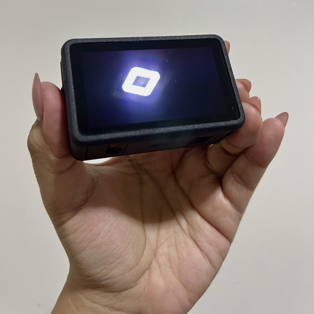 DJI Osmo Action 5 Pro — STANDARD EDITION (Category: Cameras) located in San Pedro. Submitted by violaetas (Listing ID 1466280888, Image 3). Description: ‼️ COMES WITH THE BOX AND ORIGINAL INCLUSIONS WITH ORIGINAL SANDISK SD CARD AND CARD READER ‼️ • Used twice (has been used under water once) • Minor issue: may struggle when it comes to opening the charging port, but it opens naman • Very minimal signs of usage, doesn’t affect performance • Meet-