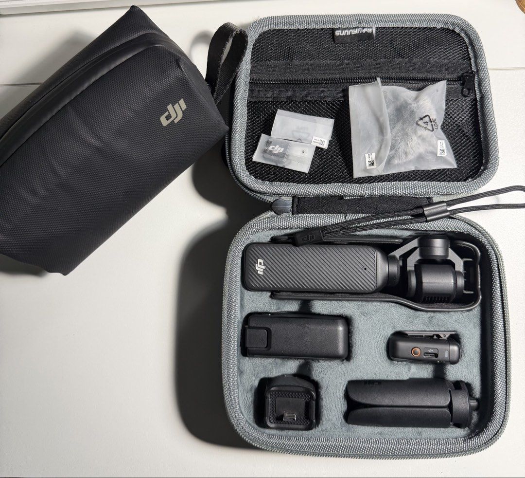 DJI Osmo Pocket 3 Creator Combo (Category: Cameras) located in Manila. Submitted by liveearth.1c7854 (Listing ID 1466231448, Image 2). Description: FS: DJI OSMO POCKET 3 CREATOR COMBO + ACCESSORIES COMPLETE SET INSIDE THE BOX: - Osmo pocket 3 - Protective cover - Dji mic 2 transmitter - Handle 1/4 - Battery handle - Mini Tripod - Type C cable - Carrying bag - Dji mic 2 clip magnet - Dji mic 2 windscreen - Wide angle lens - Wrist strap ACCESSORIES