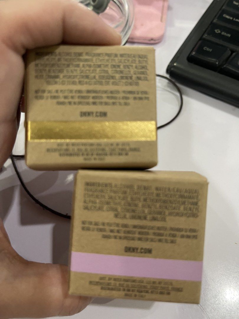 DKNY Be Delicious Eau de Parfum Mini Set (Category: Fragrance & Deodorants) located in Paranaque City. Submitted by twinmanila (Listing ID 1466159041, Image 1). Description: - Brand: DKNY Be Delicious - Volume: 2 x 7ml mini perfumes - Concentration: Eau de Parfum (EDP) - Condition: Brand new, never opened or sprayed, comes in original packaging - Colors/Variants: One gold box, one pink box - Scent Profile: Fresh and fruity - Perfect for: Travel, 