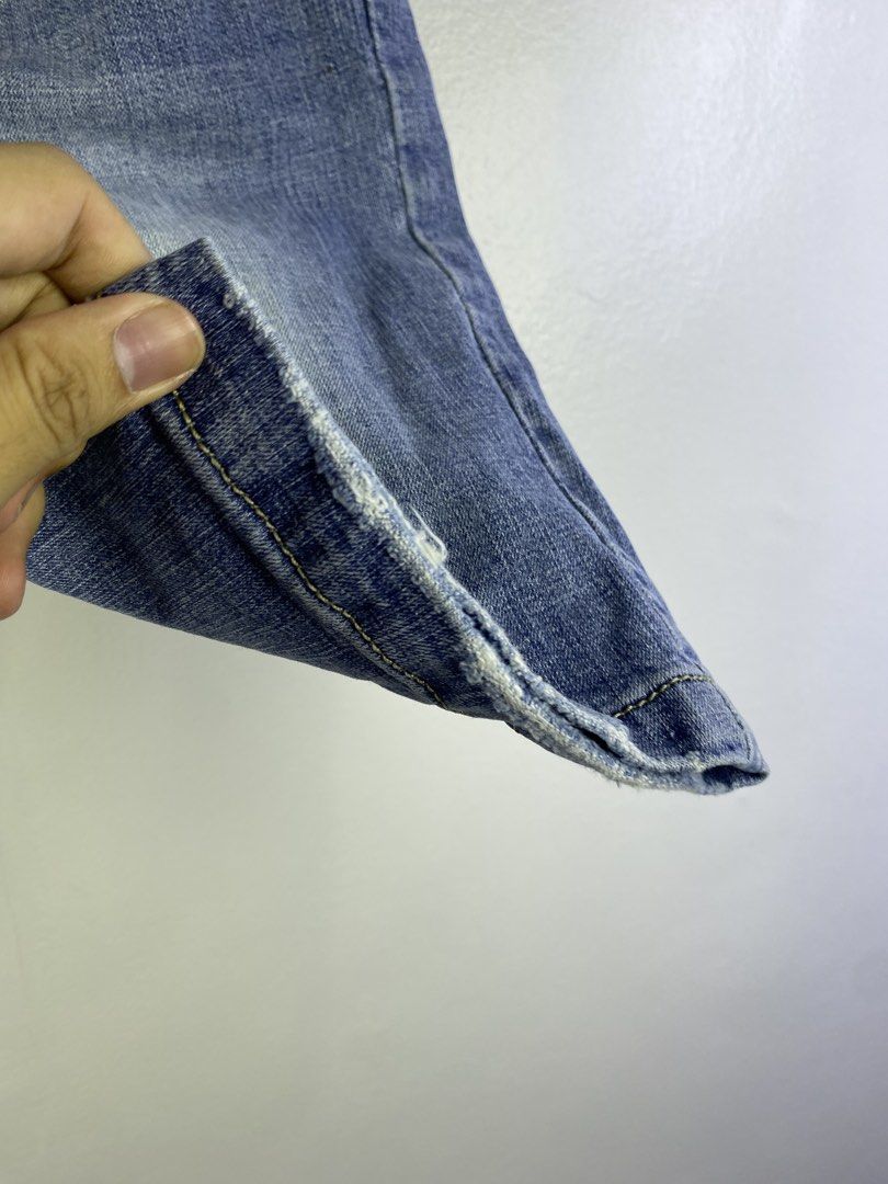 Dolce & Gabbana Denim Shorts (Category: Shorts) located in Manila. Submitted by declutterpromax (Listing ID 1466226679, Image 3). Description: - Brand: Dolce & Gabbana - Origin: Made in Italy - Wash: Light blue denim with contrast yellow stitching - Style: Mid-rise waist, classic five-pocket design, and trendy raw hem - Details: Branded metal hardware and D&G logo tag on the coin pocket - Size: 28x22x8 (as per handwritten tag).