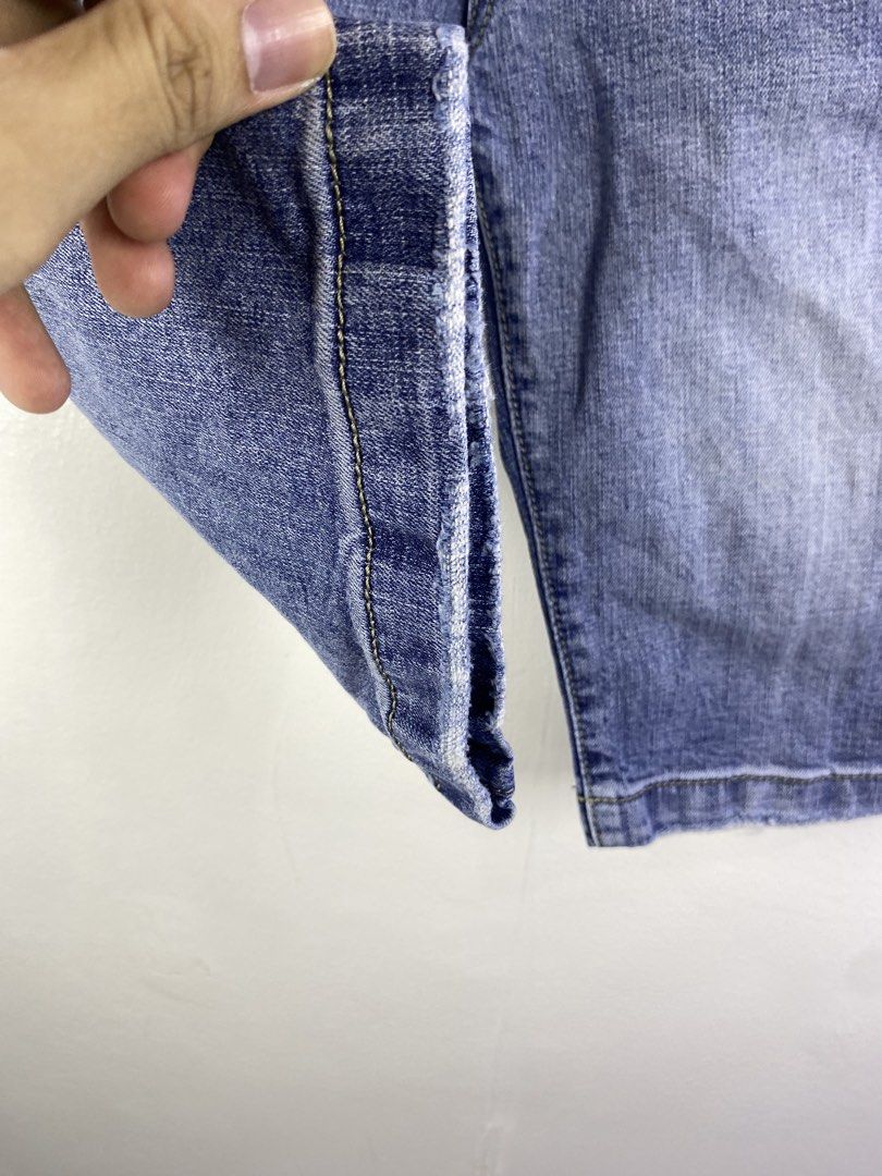 Dolce & Gabbana Denim Shorts (Category: Shorts) located in Manila. Submitted by declutterpromax (Listing ID 1466226679, Image 2). Description: - Brand: Dolce & Gabbana - Origin: Made in Italy - Wash: Light blue denim with contrast yellow stitching - Style: Mid-rise waist, classic five-pocket design, and trendy raw hem - Details: Branded metal hardware and D&G logo tag on the coin pocket - Size: 28x22x8 (as per handwritten tag).
