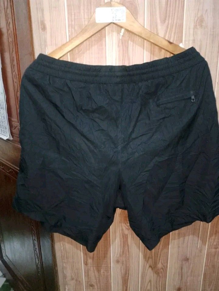 DOLCE AND GABBANA (Category: Shorts) located in Taguig. Submitted by clothingselection (Listing ID 1466200037, Image 3). Description: PTPA DOLCE AND GABBANA NYLON SHORT WIDTH 34-40 LENGTH 17.5 EXCELLENT CONDITION NID WASH FRESH FROM BALE MISSING ISANG BAKAL SA LACE.