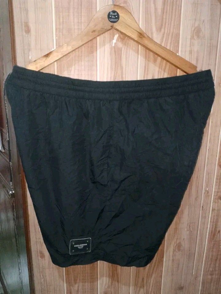 DOLCE AND GABBANA (Category: Shorts) located in Taguig. Submitted by clothingselection (Listing ID 1466200037, Image 1). Description: PTPA DOLCE AND GABBANA NYLON SHORT WIDTH 34-40 LENGTH 17.5 EXCELLENT CONDITION NID WASH FRESH FROM BALE MISSING ISANG BAKAL SA LACE.