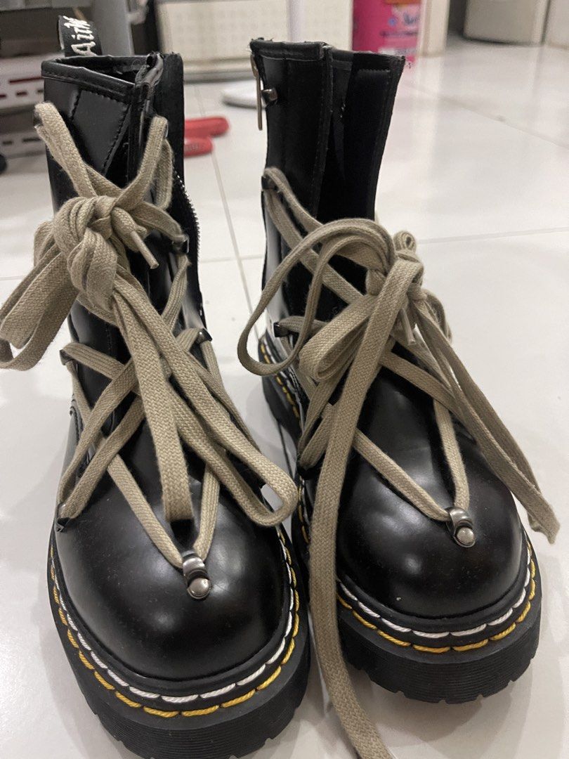 Dr. Martens Rick Owens 14xx Platform Boots (Category: Boots) located in Manila. Submitted by mariel1124 (Listing ID 1466246332, Image 1). Description: Black leather platform boots by Dr. Martens and Rick Owens collaboration. Chunky lug sole with distinctive yellow and white stitching. Extra long beige laces wrapped around the upper with metal tips. Side zipper for easy entry. Heel loop marked with Rick Owens branding..