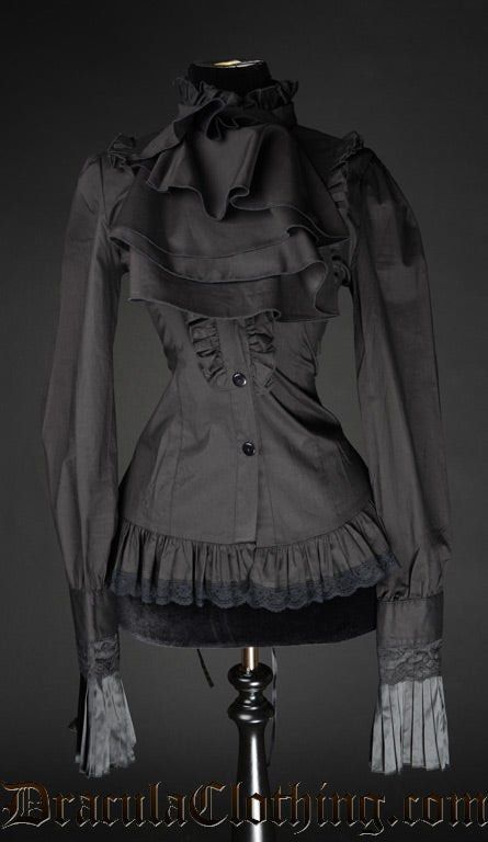 Dracula Clothing - Black Ruffle Blouse (Category: Blouses) located in Naga. Submitted by junked_garments (Listing ID 1466314660, Image 1). Description: Dracula Clothing - Black Ruffle Blouse MEASUREMENTS Pit to pit: 16.5” Waist: 12.5” Length: 27” Sleeve: 31” Shoulder: 15” DETAILS Size M On Tag Signs Of Usage No Flaw Need Wash Excellent Condition 9.5/10 Color Rate -₱1.5k.