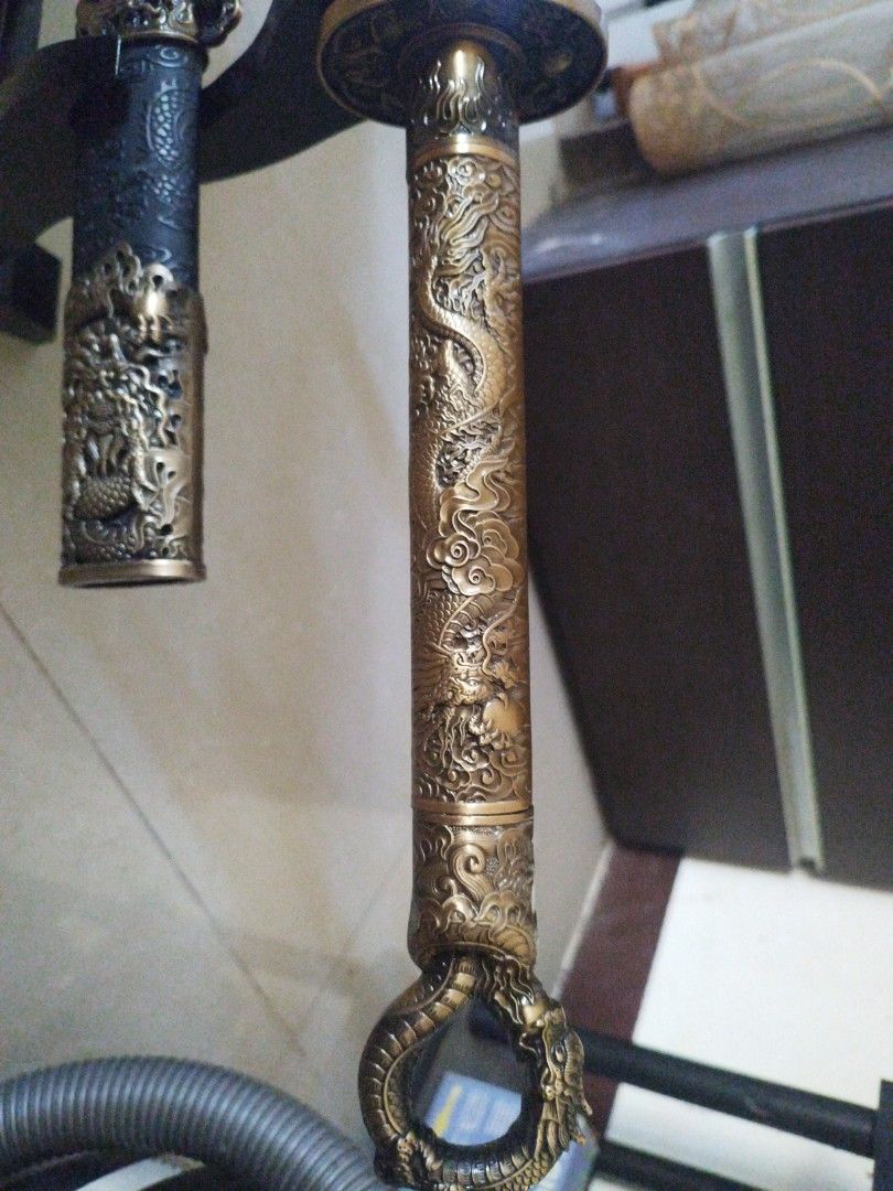 Dragon ring sword (Category: Vintage Collectibles) located in San Rafael. Submitted by jflshoppe1989 (Listing ID 1466266914, Image 2). Description: Real dragon katana sword *40 inches lenght *2kilo ang bigat ng sword nya * Brass ang kanyan handle * Mga nka embose ang details nya *Reel steel blade *Maganda hindi ka mgsisi *Good for collection Price 9500 plus shipping Mas ok Lalamove pick up Contact number 09976703787.
