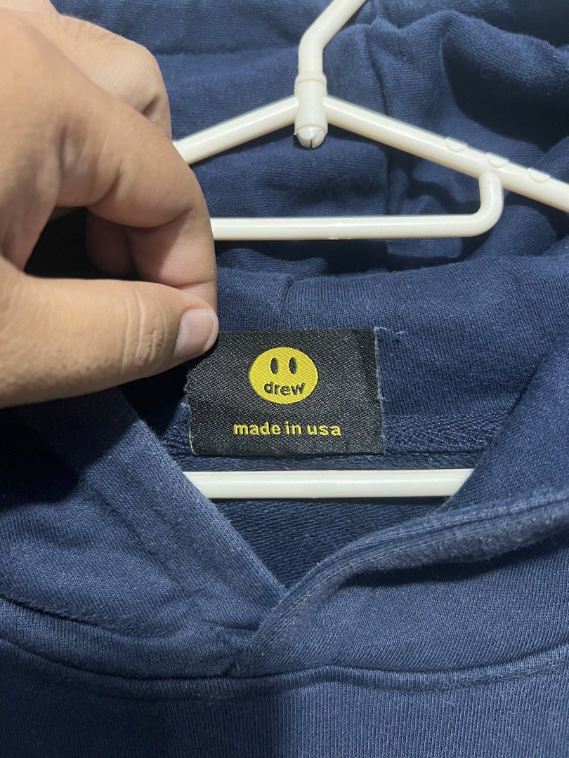 Drew House Hoodie Navy Blue (Category: Coats, Jackets and Outerwear) located in Cagayan de Oro. Submitted by thrift4all (Listing ID 1466233471, Image 3). Description: - Brand: Drew House - Style: Mascot Hoodie - Color: Dark Navy Blue - Size: Medium - Material: 100% Cotton (Made in USA) - Condition: Excellent, with neck tag and interior care labels intact.