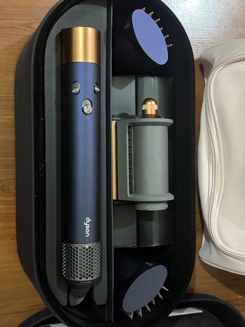 Dyson Airwrap (Category: Hair) located in Paranaque City. Submitted by criselda17 (Listing ID 1466328341, Image 1). Description: This is the 1st version. Bought in L app last year but never used. Decluttering .