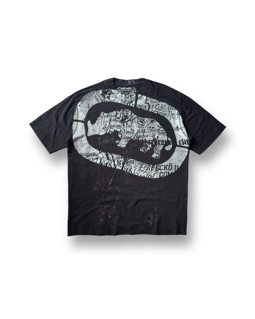 ECKO SHIRT (Category: Tshirts & Polo Shirts ) located in Davao. Submitted by kelsocool (Listing ID 1466255903, Image 1). Description: Ecko Unltd. Big Logo Graphic Tee Dimes (inch): 25.5 - length 19.5 - width 9 - sleeve color rate: 10/10 no issue good condition Model: 5’5 ft/ 54 kg Description: Classic 2000s Y2K skater/hip-hop streetwear tee featuring an oversized center rhino logo surrounded by script text print details..