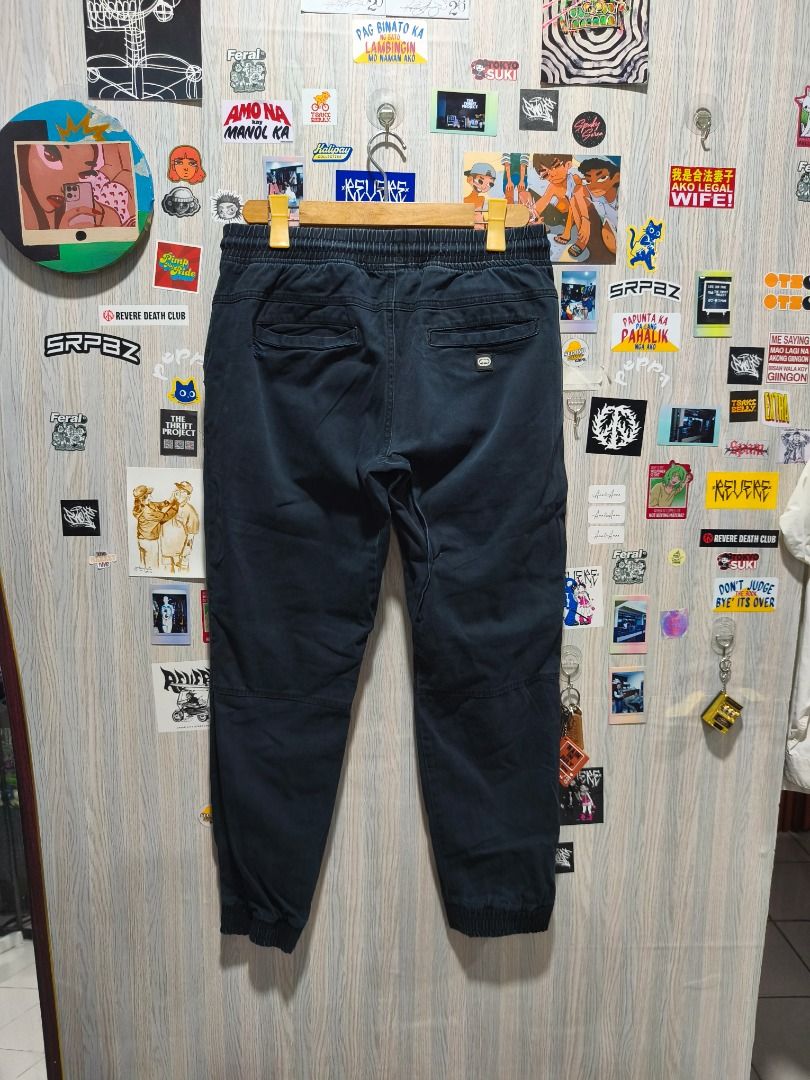 Ecko Unltd Dark Jogger Pants Size M (Category: Joggers) located in Davao. Submitted by thethriftproject082 (Listing ID 1466297144, Image 3). Description: NP18 Ecko 📍𝐌𝐈𝐍𝐄: 450 📍𝐒𝐈𝐙𝐄 𝐎𝐍 𝐓𝐀𝐆: Medium 📍𝐃𝐈𝐌𝐄𝐒: 32-34 x 40 - Brand: Ecko Unltd - Color: Dark blue - Size: Medium (M) - Waistband: Elastic with white drawstring - Design: Paneled knees, ribbed ankle cuffs - Pockets: Two front pockets and back pockets - Origin: Made in China