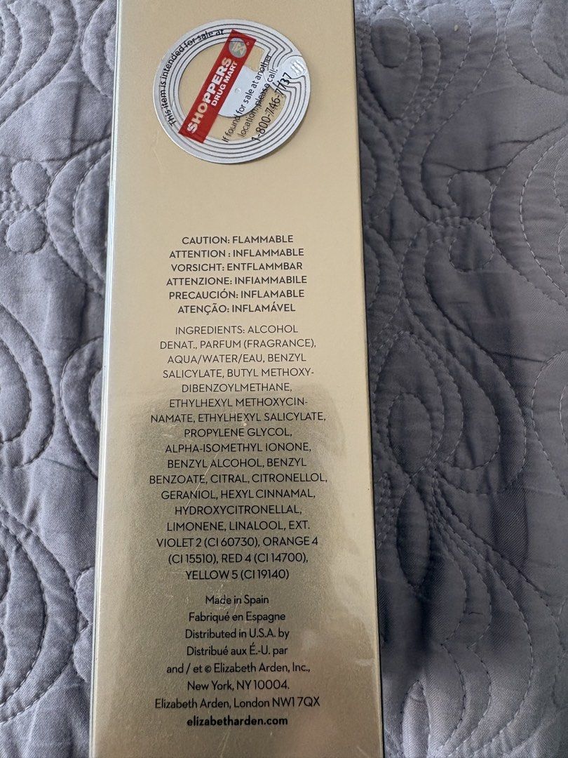 Elizabeth Arden Perfume - bought from Canada (Category: Fragrance & Deodorants) located in Antipolo. Submitted by curatedbyapril_777 (Listing ID 1466246957, Image 3). Description: - Authentic Elizabeth Arden fragrance empty gold box - Made in Spain (Distributed in New York and London) - Features full ingredient list and caution notices on the back - Original Shoppers Drug Mart price sticker attached at the top.