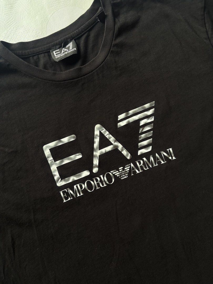 Emporio Armani EA7 Graphic Logo Tee (Category: Tshirts & Polo Shirts ) located in Tacurong. Submitted by kmthrift19 (Listing ID 1466263572, Image 3). Description: Dimes: W20.5xL26.5 Condition: 9/10 Issue: None.