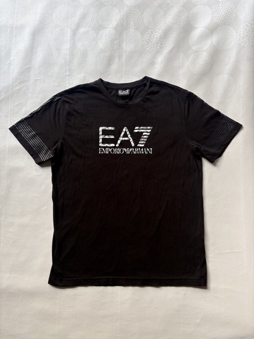 Emporio Armani EA7 Graphic Logo Tee (Category: Tshirts & Polo Shirts ) located in Tacurong. Submitted by kmthrift19 (Listing ID 1466263572, Image 1). Description: Dimes: W20.5xL26.5 Condition: 9/10 Issue: None.