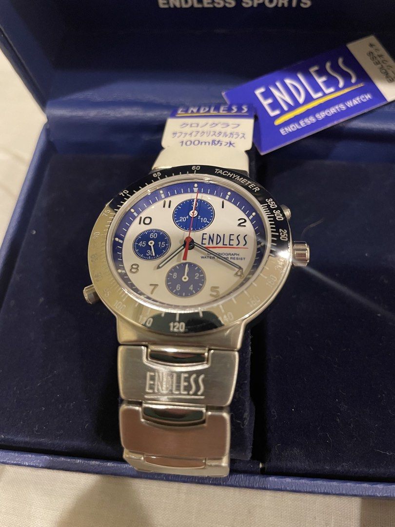 Endless Racing Chronograph Watch ER-002 (Category: Men's Watches) located in Quezon City. Submitted by bibzski (Listing ID 1466283762, Image 3). Description: - Brand: Endless Racing Chronograph - Model: ER-002 - Material: Stainless steel with sapphire crystal glass - Dial: White with blue sub-dials and tachymeter bezel - Quartz movement - Water Resistance: 100m - Condition: Brand new and unused, original tags attached, protective blue film still 