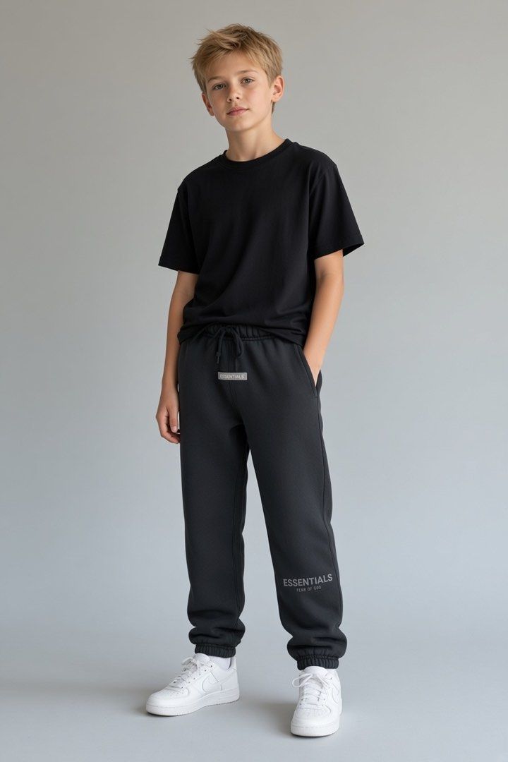 Essentials black jogger (Category: Babies & Kids Fashion) located in Lipa City. Submitted by lifestyled (Listing ID 1466177813, Image 1). Description: Essentials jogger Size 6/7 Bottom- W-9.5” L- 28” Color rate- 7/10 💯 Authentic.