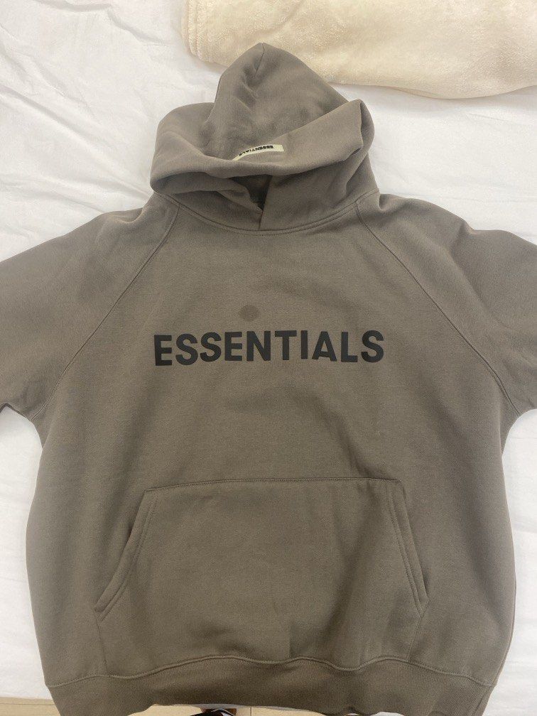 Essentials hoodie green/grey (Category: Hoodies) located in Manila. Submitted by homefindsbyalex (Listing ID 1466296279, Image 1). Description: Authentic legitimate essentials hoodie for sale 100% cotton .