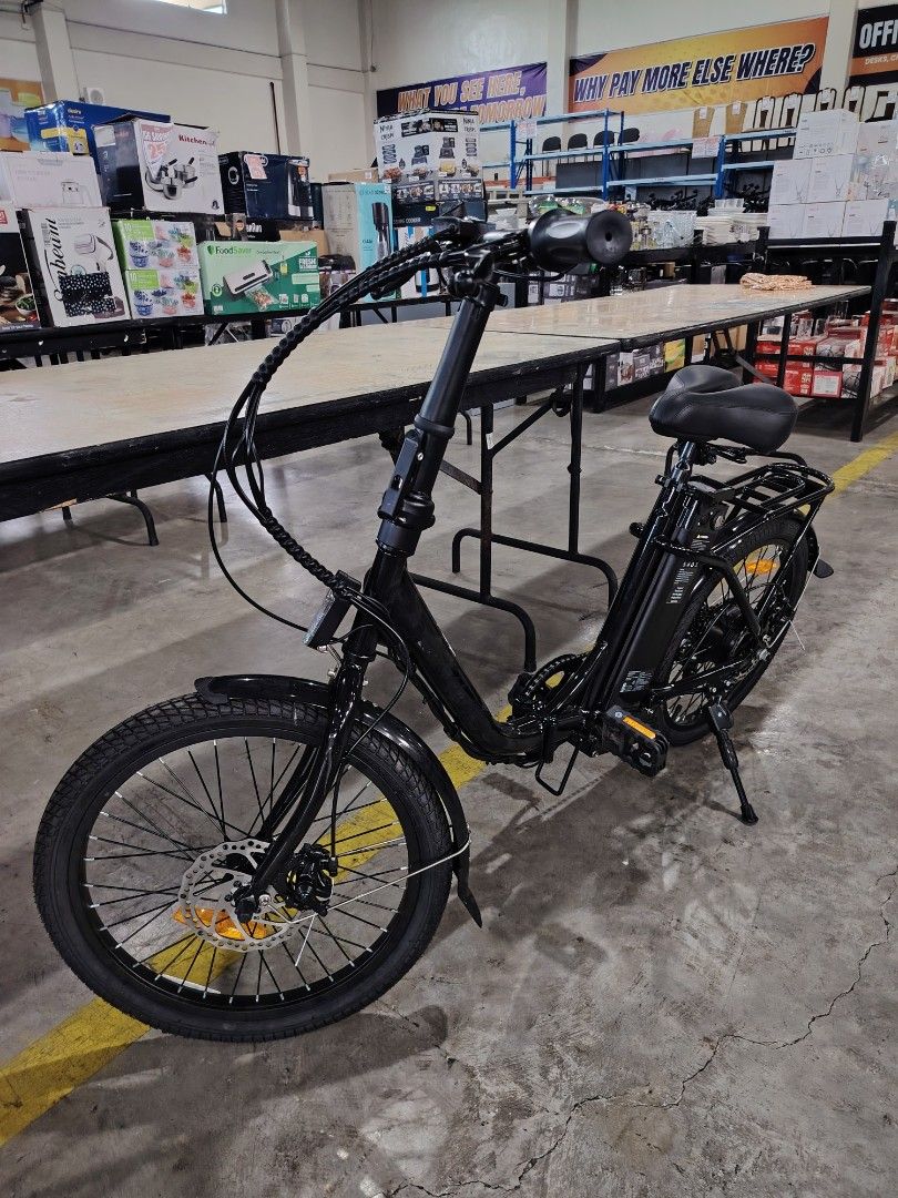 Estate Electric Folding w/ Adaptor & Key (Category: Bicycles) located in Manila. Submitted by riley1205 (Listing ID 1466224224, Image 2). Description: - Color: Sleek black - Type: Folding electric bike (easy to store and transport) - Gears: Shimano multi-speed derailleur setup - Brakes: Front and back disc brakes for reliable stopping power - Battery: Securely integrated battery pack mounted behind the seat tube with safety labels - Extras: Sturd