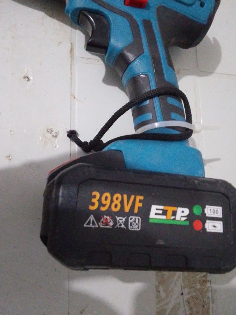 ETP 398VF Cordless Impact Drill (Category: Construction Tools & Equipment) located in Quezon City. Submitted by zealstone_baf57c (Listing ID 1466331781, Image 2). Description: - Brand/Model: ETP Cordless Impact Drill - Battery: 398VF with base gauge graphic - Chuck Range: 0.8-10mm bits - Speed: 350/min (no-load) up to 1,440/min (self-load) - Design: Blue and black body with handle tether loop - Condition: Minor workshop wear, fully tested and pow