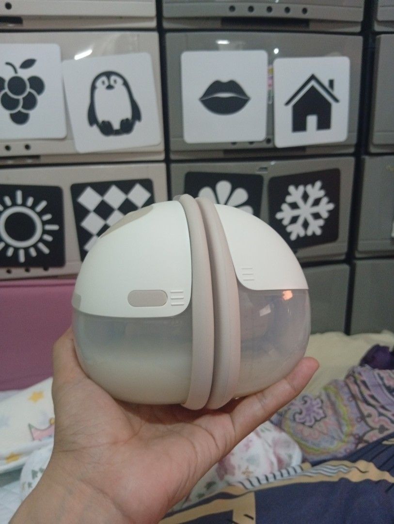 Eufy Wearable Breast Pump E20 (Category: Breastfeeding & Bottle Feeding) located in Caloocan City. Submitted by sweetlulu0613 (Listing ID 1466277438, Image 2). Description: - Brand: Eufy Wearable Breast Pump E20 (Original box included) - Heatflow Technology: Warms up while pumping to stimulate better milk flow - Hands-Free & Discreet: Fits comfortably right inside your bra - Strong & Reliable: Hospital-grade suction power with a leakproof design 