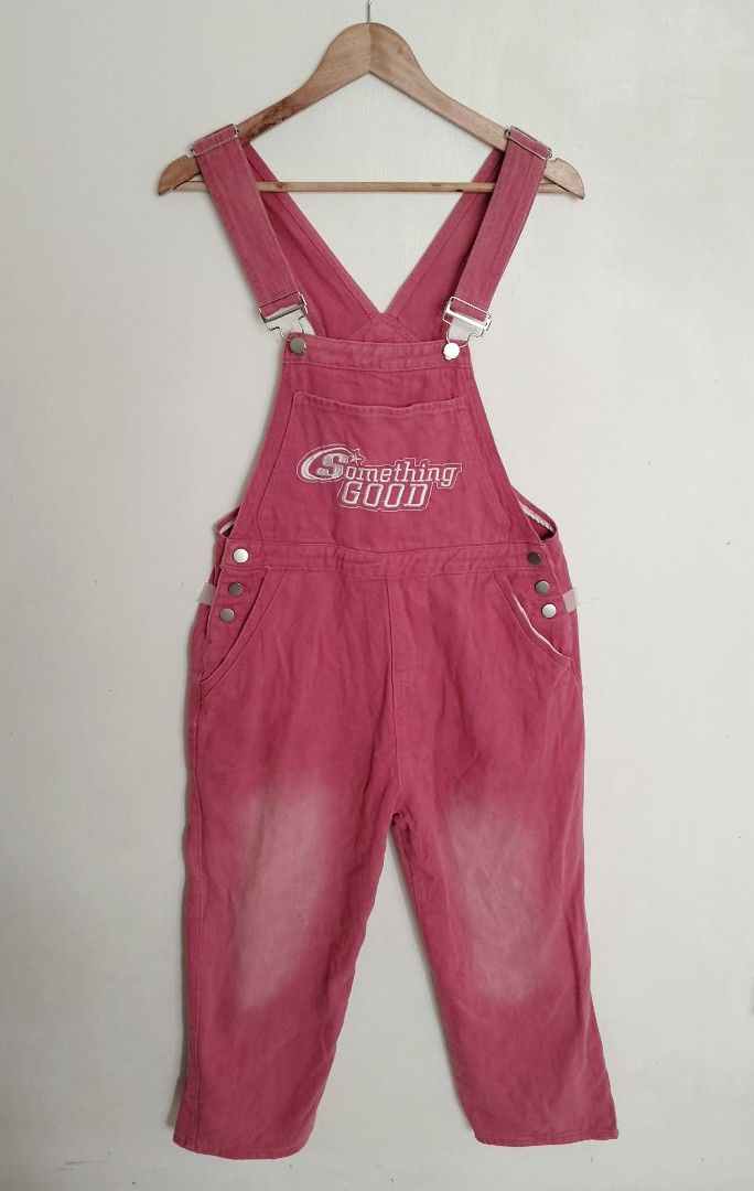 EVDR Pink Denim Overalls Something Good (Category: Jumpsuits) located in Bulacan. Submitted by clutsngo (Listing ID 1466185903, Image 1). Description: - Brand: EVDR - Color: Vibrant pink wash with intentional faded patches on knees and back - Material: Durable cotton with strong stitching - Details: 'Something Good' embroidered on the front bib pocket - Features: Classic adjustable straps, front and back pockets, and metal side button closures.