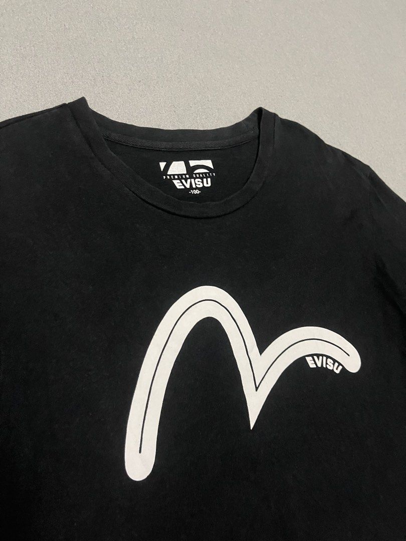 Evisu Tee (Category: Tshirts & Polo Shirts ) located in Bulacan. Submitted by sanjisthrift (Listing ID 1466308437, Image 2). Description: Size Medium Width 19 Length 27 Good Condition 9/10 Good fade.