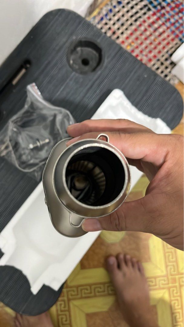 Exhaust muffler 370MM (Category: Mufflers, Exhaust Parts & Accessories) located in Manila. Submitted by finderskeepersmnl_092026 (Listing ID 1466171880, Image 3). Description: - Brand/Model: Akrapovic Universal Slip-On Exhaust Muffler - Size: 370MM length - Color: Premium Silver finish - Sound Profile: Loud and aggressive racing sound - Compatibility: Universal fit for Honda, Yamaha, and other motorcycles - Inclusions: Complete with mounting brac