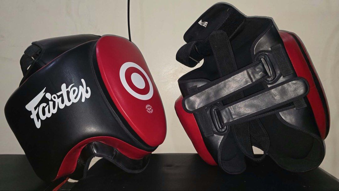 Fairtex Ultra Lite Thigh Pad TP5 (Black/Red) (Category: Combat Sports) located in Caloocan City. Submitted by yiyilittlethings (Listing ID 1466293996, Image 2). Description: Fairtex Ultra Lite Thigh Pad TP5 (Black/Red) Condition: Not used, new Original Price: 175 USD Price: 6k.