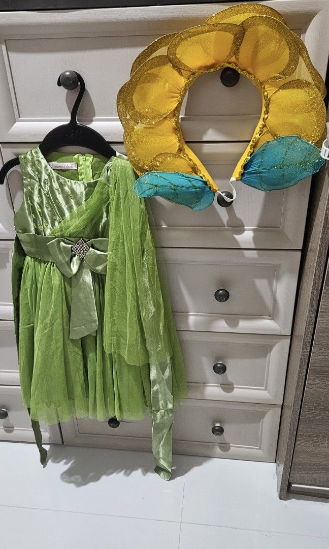 Fairy dress for kids (Category: Babies & Kids Fashion) located in Navotas City. Submitted by happyfindstuff4u (Listing ID 1433667546, Image 2). Description: Best fit 5-6 P250 Inclusion: Dress and Headflower Lightly flaw on the dress back but sti in good condition.