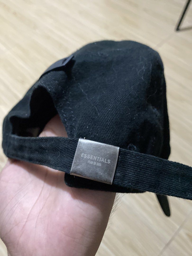Fear of God Essentials 1977 Black Cap (Category: Caps & Hats) located in Davao. Submitted by jayelcarba61168 (Listing ID 1466314611, Image 3). Description: - Brand: Fear of God Essentials - Color: Black with white "1977" embroidery - Details: Essentials logo metal buckle, rubber label on the back - Fit: Adjustable strapback (one size fits most) - Condition: Brand new / Excellent quality - Style: Versatile streetwear staple, easy to match with dai