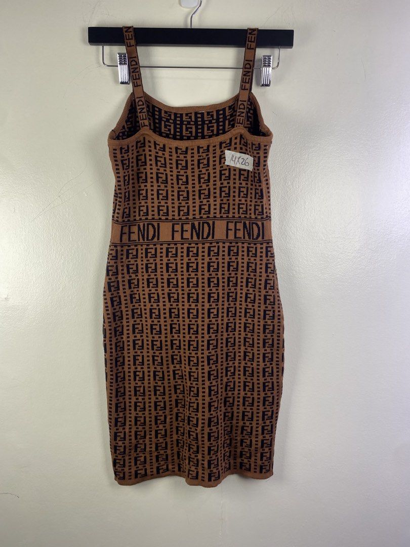 Fendi FF Monogram Knit Bodycon Dress (Category: Dresses) located in Manila. Submitted by declutterpromax (Listing ID 1466226668, Image 1). Description: - Brand: Fendi - Design: Brown and black monogram knit bodycon dress with all-over FF jacquard pattern - Details: Spaghetti straps with Fendi logo tape and prominent Fendi lettering band across the chest - Fit: Mid-length, stretch fit, fitted silhouette - Condition: Good pre-loved condition with a