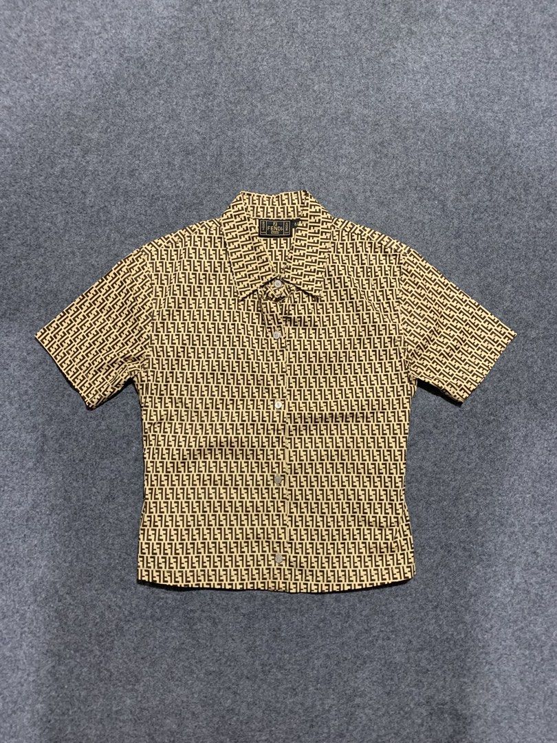 Fendi Monogram Short Sleeve Button-Up Shirt Size 44 (Category: Tshirts & Polo Shirts ) located in Cebu City. Submitted by ninyothrift (Listing ID 1466304299, Image 1). Description: - Brand: Fendi - Design: Iconic brown and beige FF monogram print - Style: Short sleeve button-up with classic collar and branded buttons - Size: Tagged Size 44 - Condition: Clean stitching, lightweight, and ready to wear - Fast shipping available across the Philippine