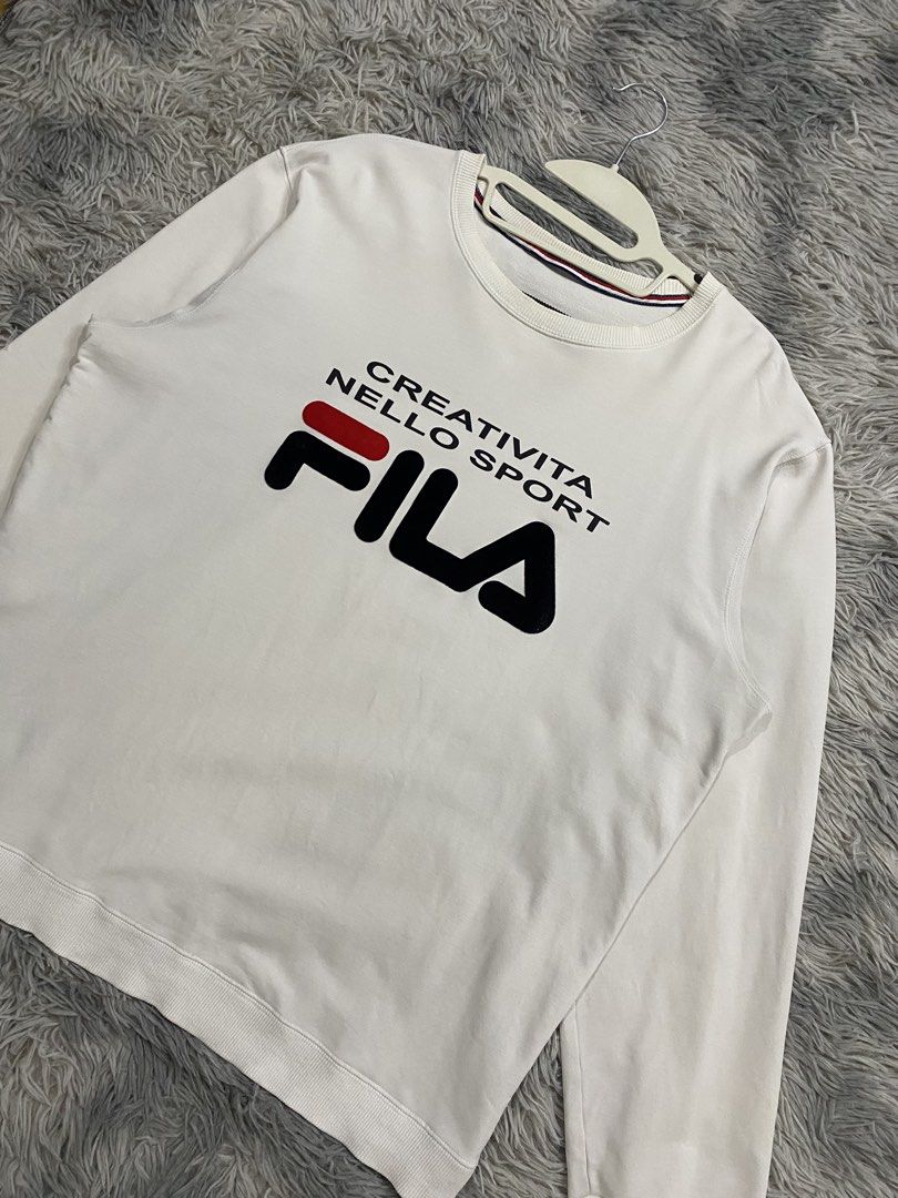 Fila Sweater (Category: Coats, Jackets and Outerwear) located in Manila. Submitted by kurtmnla (Listing ID 1466303531, Image 2). Description: Fila sweater -Size M FIT / Unisex -Condition 9.5/10 -Dimes 22x26 -issue Minimal Dirt Quezon city.