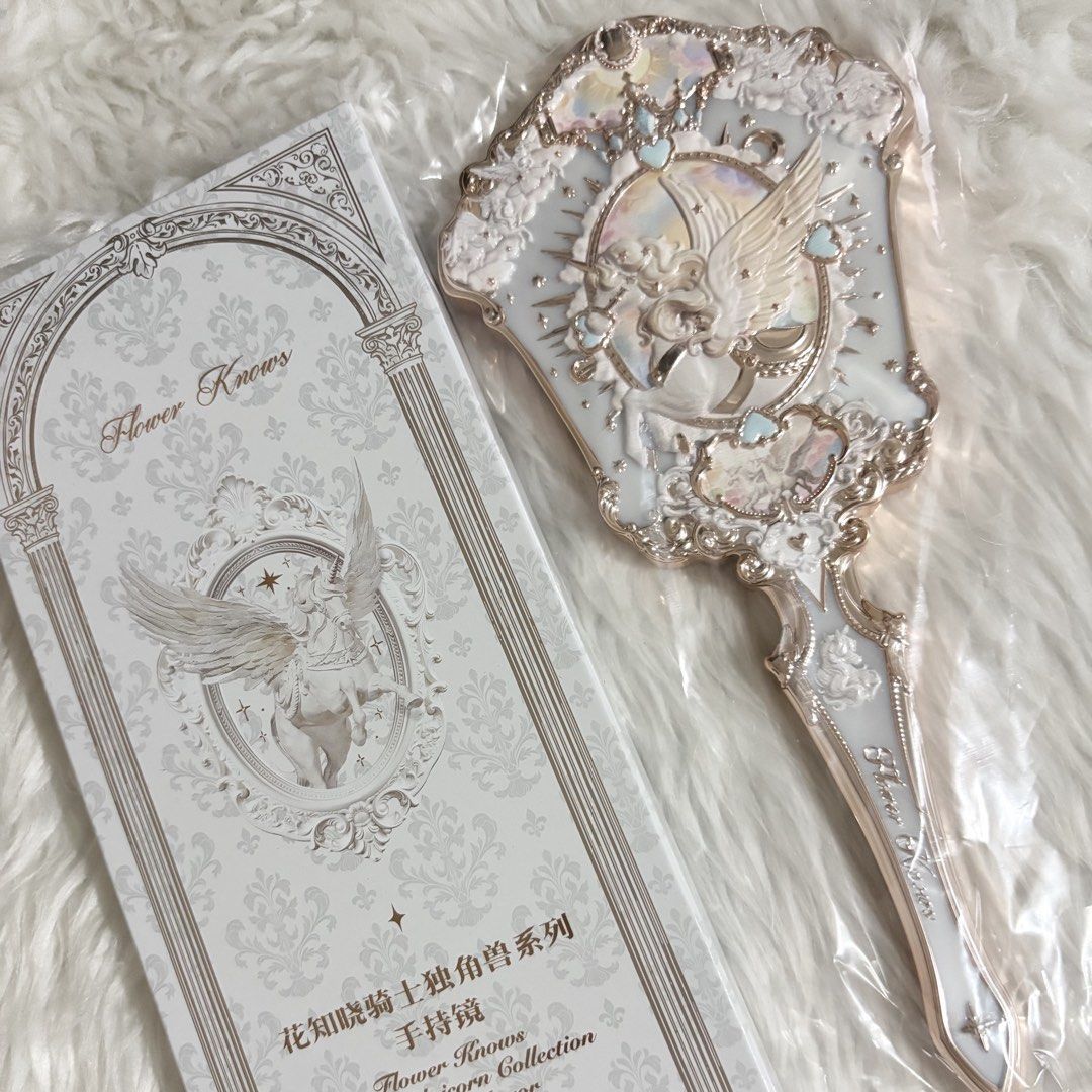 Flower Knows Knight Unicorn Hand Mirror (Cloud White) (Category: Makeup) located in Cavite. Submitted by 3yaaa018 (Listing ID 1466240662, Image 2). Description: Flower Knows Knight Unicorn Hand Mirror (Cloud White) - ₱900 - brand new, never been used (on hand - below srp) - authentic flower knows, includes original box - protective plastic film is still attached to the mirror and has never been removed - can send more photos and details upon requ