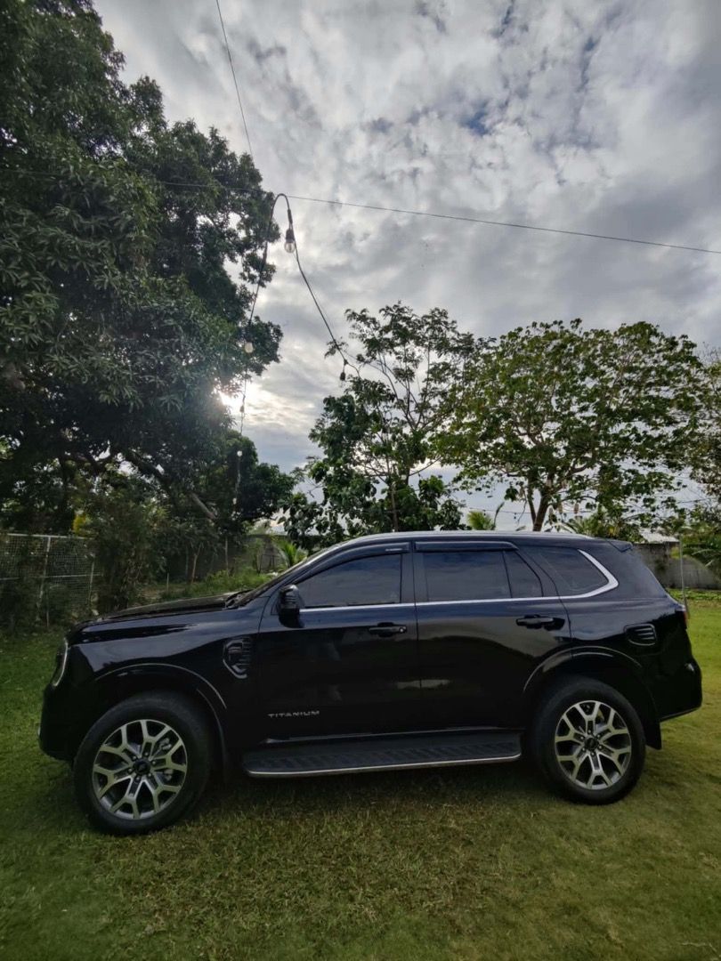 Ford Everest (Category: Used Cars) located in Candelaria. Submitted by froywonderland (Listing ID 1466204353, Image 2). Description: Here are the details: • 54,000 km • 2024 Ford Everest Titanium+ 4x2 • Absolute Black • First owner • Fully paid • CASA maintained • Complete service records • Registered until 2027 • Comprehensive insurance until March 2027 • No flood history • Ceramic coating, tint, mats & other accessories.
