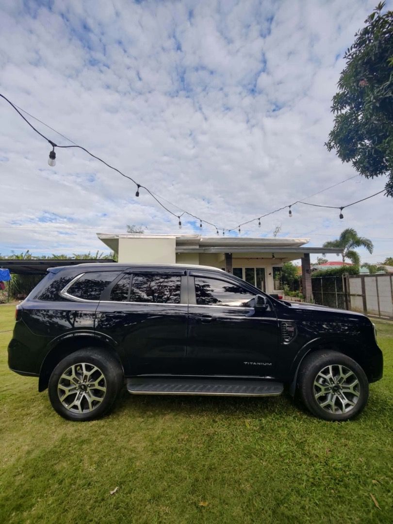 Ford Everest (Category: Used Cars) located in Candelaria. Submitted by froywonderland (Listing ID 1466204353, Image 3). Description: Here are the details: • 54,000 km • 2024 Ford Everest Titanium+ 4x2 • Absolute Black • First owner • Fully paid • CASA maintained • Complete service records • Registered until 2027 • Comprehensive insurance until March 2027 • No flood history • Ceramic coating, tint, mats & other accessories.