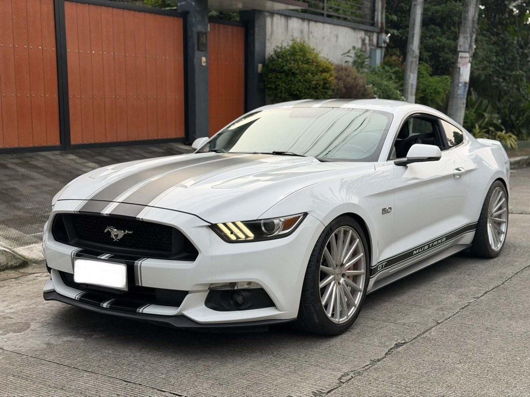 Ford Mustang GT 5.0 V8 Auto (Category: Used Cars) located in Manila. Submitted by quality_cars (Listing ID 1466264964, Image 3). Description: FOR SALE‼️ 2015 FORD MUSTANG GT 5.0 V8 Automatic Transmission Oxford White / Original Paint Gasoline Engine 30+ Mileage Push Start Button New 20’ Vossen VF Series Mags New Michellin Tires Brembo Brakes Front (Big Caliper) Brembo Brakes Back (Dual Caliper) Borla Full Exhaust Racing Stripes Installed Complete