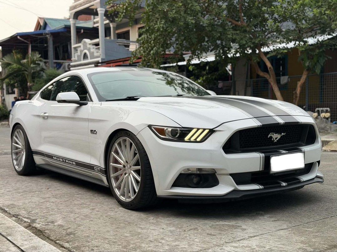 Ford Mustang GT 5.0 V8 Auto (Category: Used Cars) located in Manila. Submitted by quality_cars (Listing ID 1466264964, Image 2). Description: FOR SALE‼️ 2015 FORD MUSTANG GT 5.0 V8 Automatic Transmission Oxford White / Original Paint Gasoline Engine 30+ Mileage Push Start Button New 20’ Vossen VF Series Mags New Michellin Tires Brembo Brakes Front (Big Caliper) Brembo Brakes Back (Dual Caliper) Borla Full Exhaust Racing Stripes Installed Complete
