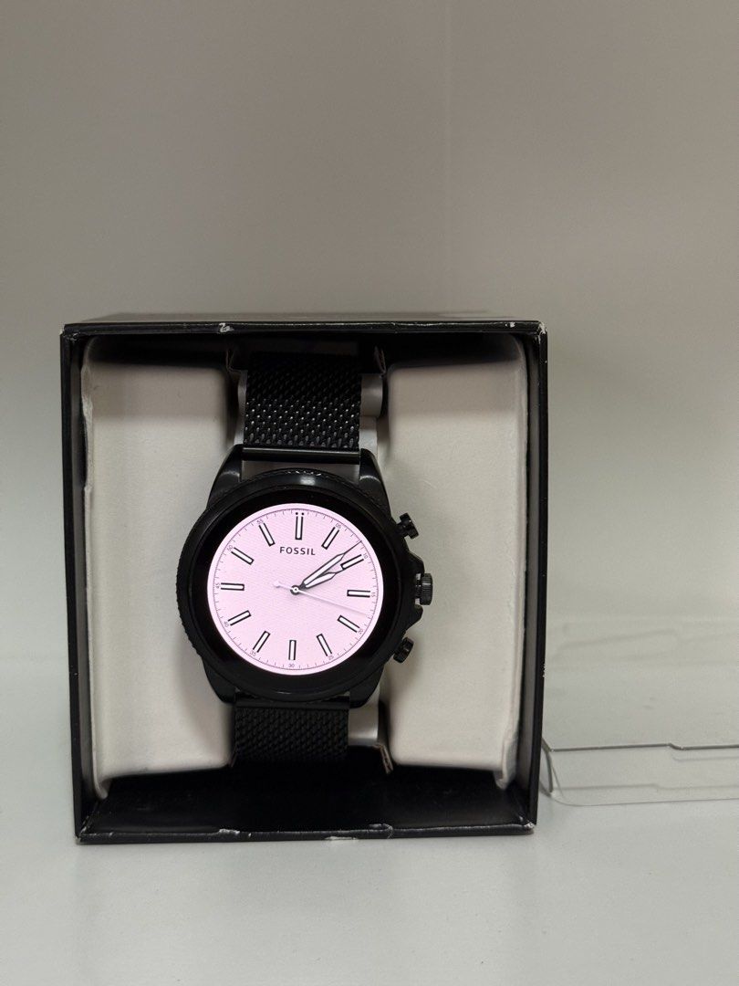 Fossil Gen 6 Smartwatch Black Mesh Strap DW13F2 (Category: Wearables & Smart Watches) located in Pasig City. Submitted by eiramcat01 (Listing ID 1466244539, Image 3). Description: - Brand: Fossil Smartwatch - Color: All-black case with matching black mesh metal strap - Display: Digital display inside a classic round dial - Features: Built-in heart rate sensor and 3-button navigation - Strap: Standard quick-release pins for easy strap swapping - I