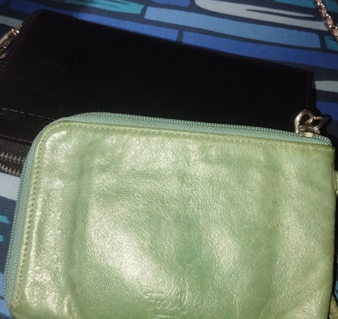 Fossil Green Leather Zip Wallet (Category: Wallets & Card holders) located in Manila. Submitted by lene48 (Listing ID 1466218263, Image 1). Description: - Fossil green leather zip-around wallet - Fun, colorful circle pattern fabric lining inside - Multiple built-in card slots for easy organization - Made of 100% genuine leather - Bonus: Includes a compact black Starbucks wallet in the bundle - Compact and easy to toss into any bag.