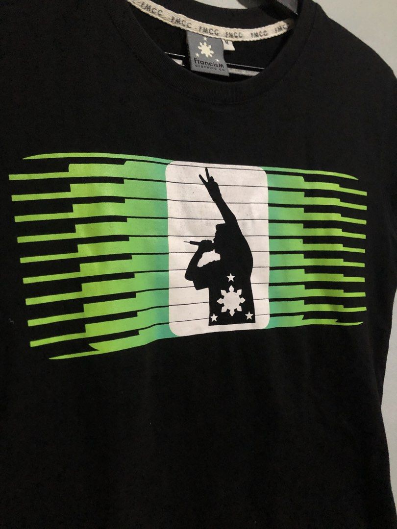 FrancisM Clothing Co. (Category: Networking) located in Tarlac. Submitted by jds_thrift (Listing ID 1466288123, Image 3). Description: 𝗙𝗠𝗖𝗖 𝗠𝗜𝗖 𝗕𝗟𝗜𝗡𝗚 𝗚𝗥𝗘𝗘𝗡 𝗚𝗥𝗔𝗣𝗛𝗜𝗖 *2010s WOMEN'S T-SHIRT * 𝗧𝗔𝗚: Francis M Clothing C.O 𝗖𝗢𝗡𝗗𝗜𝗧𝗜𝗢𝗡: 9.5/10 𝗦𝗜𝗭𝗘: M 𝗠𝗘𝗔𝗦𝗨𝗥𝗘𝗠𝗘𝗡𝗧𝗦: L 24.5” × W 16” 💸 𝗠𝗜𝗡𝗘: ₱250.
