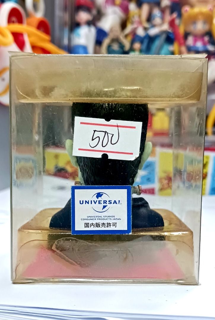 Frankenstien Universal Studios Monsters (Category: Vintage Collectibles) located in Manila. Submitted by mickey_salonga (Listing ID 1466333022, Image 2). Description: - Official Universal Studios Monsters licensed merchandise - Includes Frankenstein mini bust - Crafted from durable polyresin - Displayed in clear boxes with striking red bases - Great vintage pieces for horror collectors.