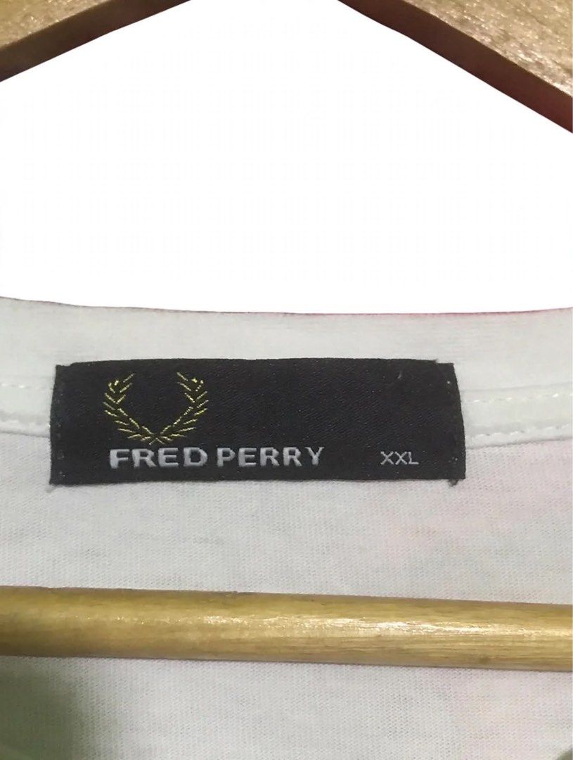 Fred Perry Embroid Design Shirt (Category: Tshirts & Polo Shirts ) located in Bulacan. Submitted by bleue.finds (Listing ID 1466301379, Image 2). Description: Fred Perry Embroid Design Shirt 22 - width 28.5 - length 2 pinholes sa taas ng letter and likod ng shirt stain washable good condition no other issues.