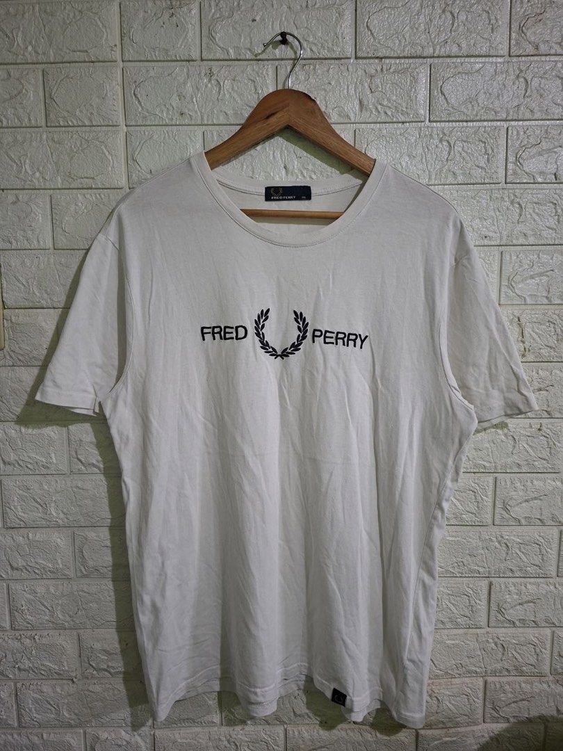 Fred Perry Embroid Design Shirt (Category: Tshirts & Polo Shirts ) located in Bulacan. Submitted by bleue.finds (Listing ID 1466301379, Image 1). Description: Fred Perry Embroid Design Shirt 22 - width 28.5 - length 2 pinholes sa taas ng letter and likod ng shirt stain washable good condition no other issues.