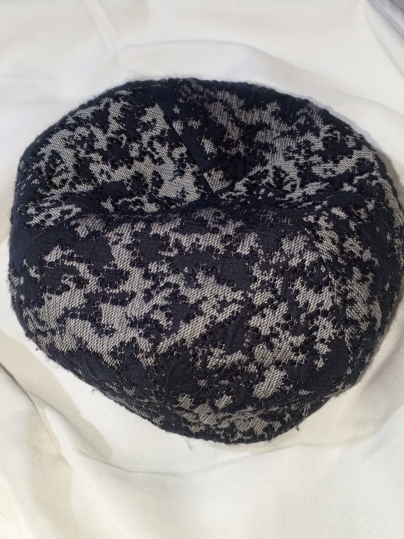 French styled art's black and grey patterned knit beret (Category: Coats, Jackets and Outerwear) located in Manila. Submitted by sengfigther06francis (Listing ID 1466263498, Image 2). Description: art's French styled Black and grey patterned knit beret hat, featuring an all-over abstract or jacquard textured weave..