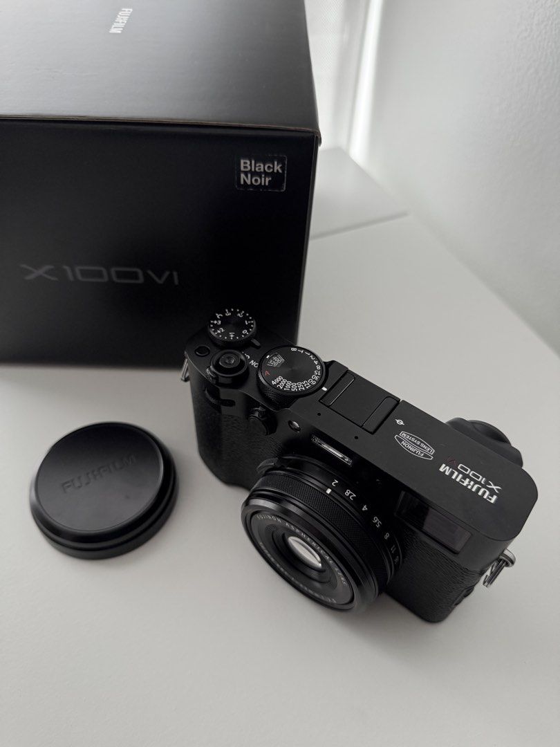 Fujifilm X100VI Digital Camera Black Noir (Category: Cameras) located in Manila. Submitted by shop.aija (Listing ID 1466203174, Image 2). Description: Fujifilm X100VI (Black) Fixed 23mm f/2 lens 2k shutter count Lightly used, still in great condition Bought in Altitude last Oct 2025 Comes with original box and FREE mist filter RFS switching to a different camera Meet-up: QC.